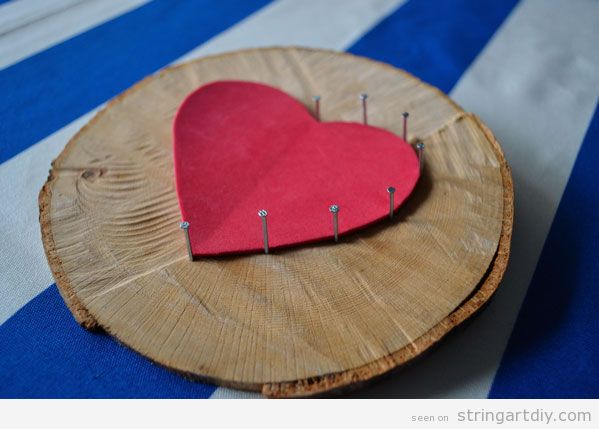 Heart String Art on a tree slice, step 2