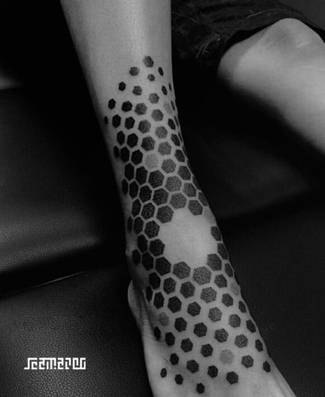 Geometric foot tattoo